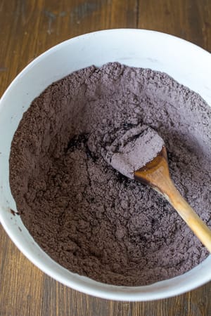 mixing ingrediants for chocolate cookies Easy Flourless Chocolate Cookies Recipe Step