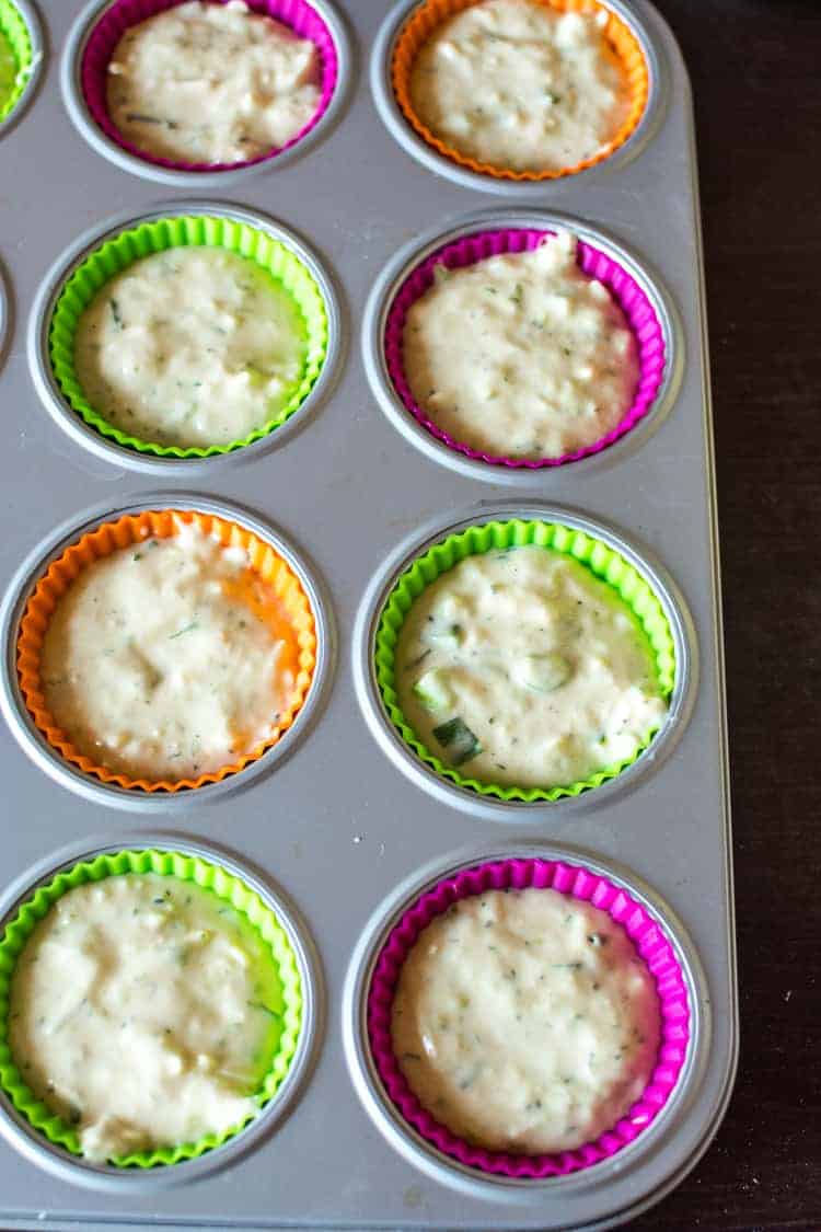 Zucchini muffin mix in muffin tin Zucchini muffin mix in muffin tin