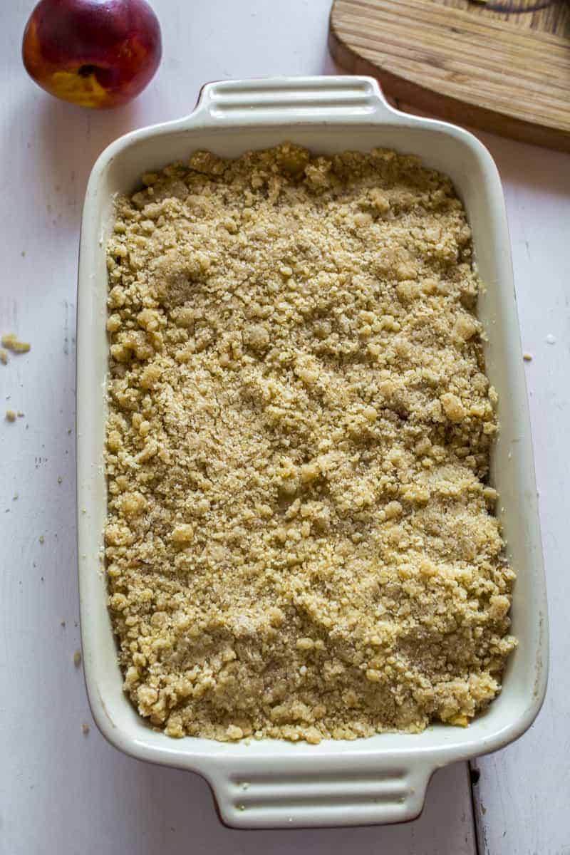 press crumble over the fruits press crumble over the fruits