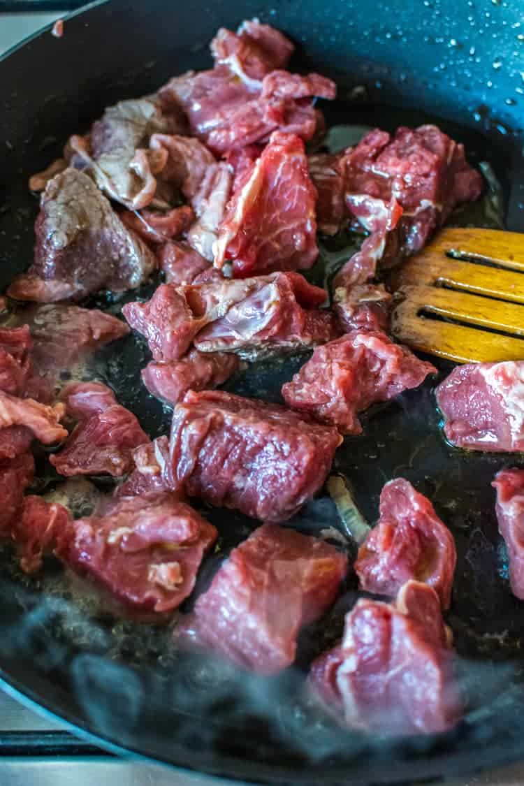 Cooking beef in a pan